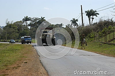 Trucks driving on road Editorial Stock Photo