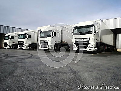 Trucks loading at warehouse logistic Editorial Stock Photo