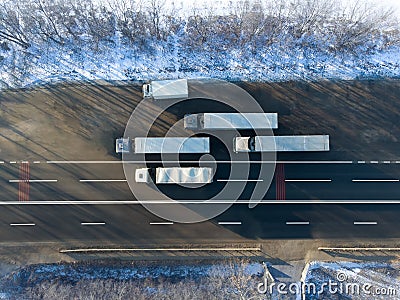 Trucks are parked on the side of the road. Top view of transport trucks Stock Photo