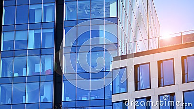 Glass building with transparent facade of the building and blue sky. Stock Photo