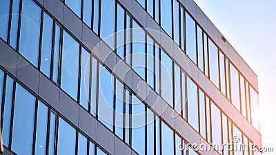 Glass building with transparent facade of the building and blue sky. Stock Photo