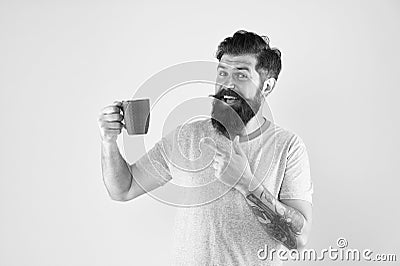 True specialty coffee is becoming big business. Energy concept. Hipster barista yellow background. Coffee shop. Bearded Stock Photo