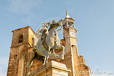 Trujillo main square with the Church of San Martin and the equestrian statue of Francisco Pizarro Editorial Stock Photo