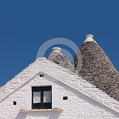 Trulli of Alberobello detail of typical conical roofs Stock Photo