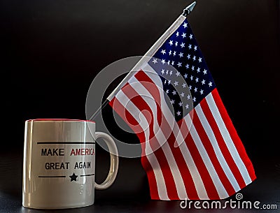 Trump make america great again coffee cup with little america flag in it Editorial Stock Photo