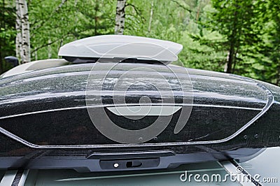 Trunk box fixed at roof top of the car. Stock Photo