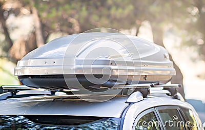 Trunk box fixed at roof top of the car Stock Photo