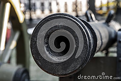 Trunk of a heavy cast-iron gun close up, smooth-bore cannon Stock Photo