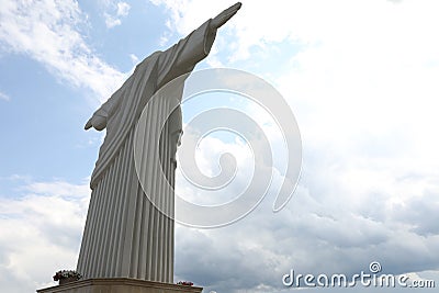Truskavets, Ukraine - July 22, 2023: Beautiful statue of Christ the Redeemer against cloudy blue sky, low angle view. Space for Editorial Stock Photo