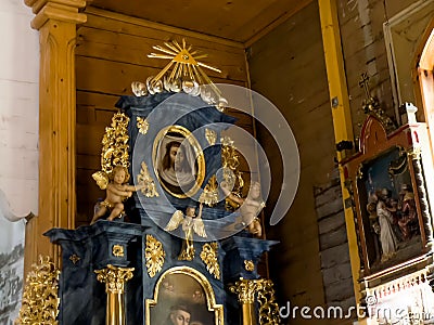 Truskolasy, Poland, July 9, 2022: Sanctuary of Our Lady in Truskolasy. The largest larch church in Poland. Part of the renovated Editorial Stock Photo
