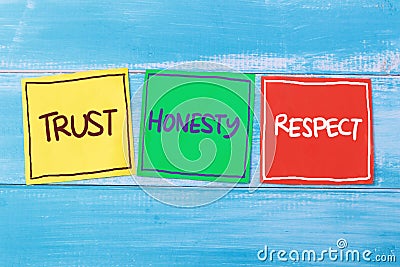 Trust honesty respect, text words typography written on paper against wooden background, life and business motivational Stock Photo