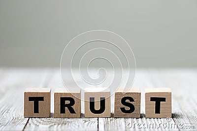 Trust word written on wood block Stock Photo