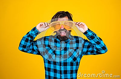 Try on a new style. funny and joyful man wear checkered shirt. just having fun. happy brutal party goer. mature bearded Stock Photo