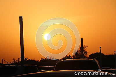 Sun picture behind car Stock Photo