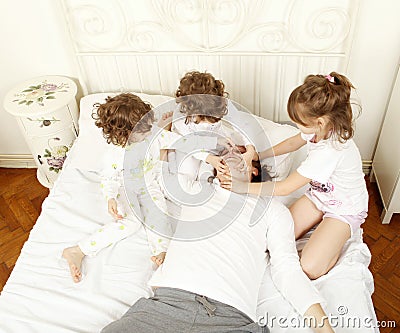 Trying to stop a man to snore Stock Photo