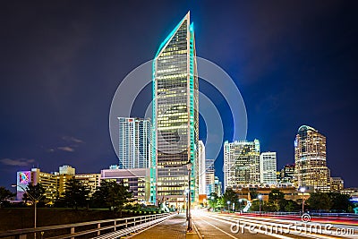 Tryon Street and modern skyscrapers at night, in Uptown Charlotte, North Carolina. Stock Photo