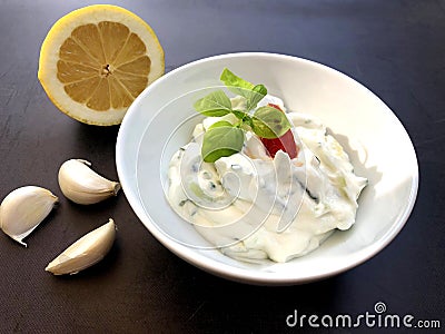 Tsatsiki, Greek tzatzÃ­ki, also Tzatziki is a wonderful, refreshing appetizer of Greek cuisine Stock Photo