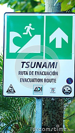 Tsunami evacuation route sign on the beach Editorial Stock Photo