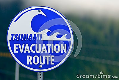 Tsunami Warning Evacuation Sign Stock Photo