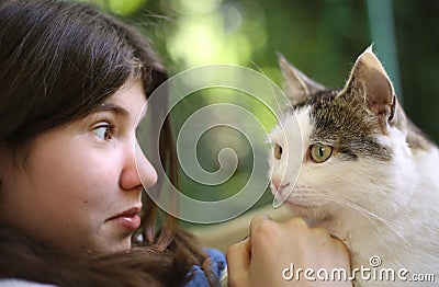 Tteen girl hug cat Stock Photo