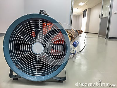 Tube Fan with confined space, Portable Ventilation Fans and Exhaust Fans from exit door at factory Stock Photo