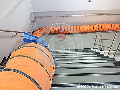 Tube Fan with confined space, Portable Ventilation Fans and Exhaust Fans on stair at factory Stock Photo