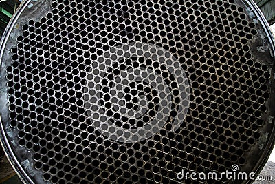 Tube Sheet of the heat exchanger, the water heater in the boiler as background at fabrication industrial Stock Photo