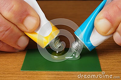 Tubes With Epoxy Glue Stock Photo