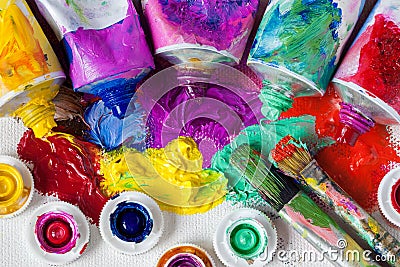 Tubes of oil paint, palette and artist paintbrushes Stock Photo