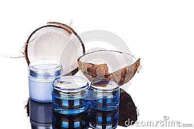 Tubs containing coconut oil are used as moisturizer for skin Stock Photo
