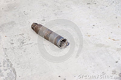 a tubular drill for drilling large holes in concrete lies on a monolithic ceiling Stock Photo