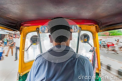 Tuc Tuc rickshaw taxi driver in New Delhi Editorial Stock Photo