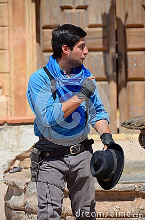 A young cowboy is a professional pastoralist or mounted livestock herder Editorial Stock Photo