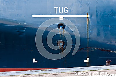 Tug area sign on ship hull. Stock Photo