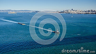 Tug boat tows a barge in the San Francisco Bay Editorial Stock Photo