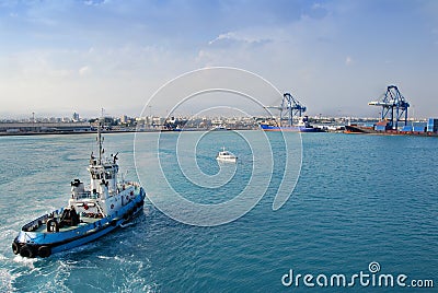 Tugboat nears Container Port, Cyprus Stock Photo