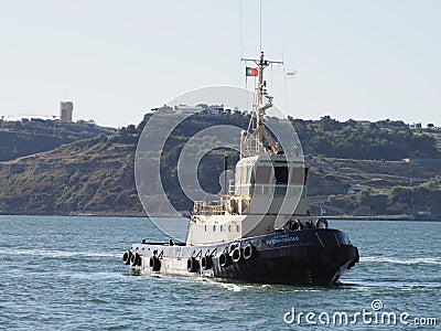 Tugboat on the Tagus - Belem, Lisbon - full view Editorial Stock Photo