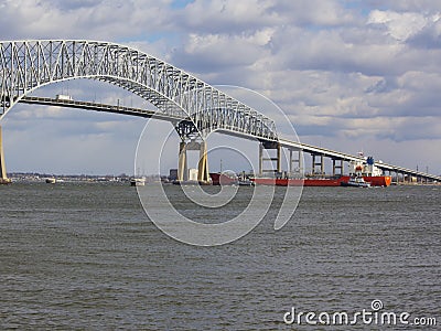 Tugs assisting tanker near Baltimore`s Key Bridge Stock Photo