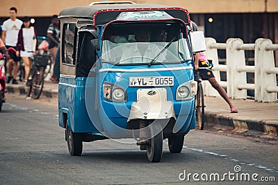 Tuk-tuk auto rickshaw. Bajay or Bajaj Editorial Stock Photo