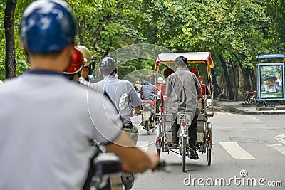 Tuktuk cyclo driver in Hanoi, Vietnam Editorial Stock Photo