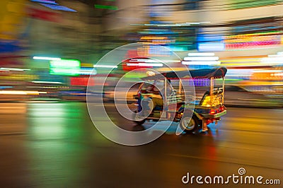 Tuk-tuk in motion blur, Bangkok, Thailand Stock Photo