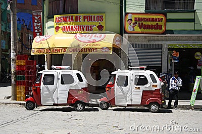 Tuk Tuk taxi cars at the restaurant in Coroico, Bolivia Editorial Stock Photo