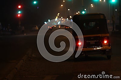 Tuktuk auto rickshaw on empty City road Stock Photo