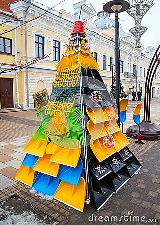 Christmas tree from cleaning equipment. Festival of creative Christmas trees on Metallistov stree Editorial Stock Photo