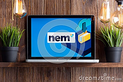 Tula Russia 16.01.20 nem wallet on the laptop screen isolated. Editorial Stock Photo