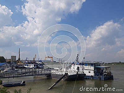 Landscape of Tulcea harbor! Boats on water! Editorial Stock Photo