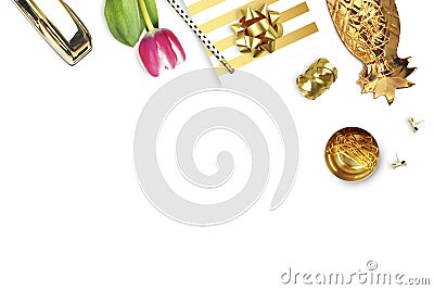 Tulip, gold stapler, pencil.Table view. Still life of fashion. Flat lay. Stock Photo