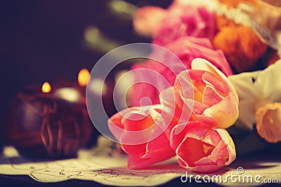Tulips and candles Stock Photo