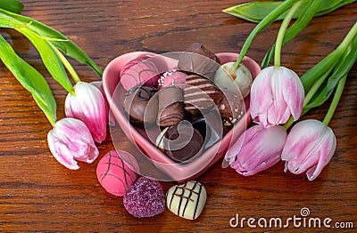 Tulips and chocolates for mothers day Stock Photo