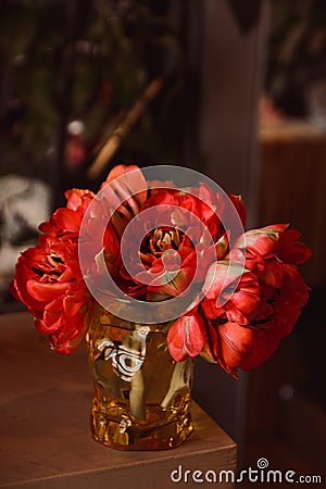 Tulips of flowers on a leg in the interior of the restaurant for a celebration shop floristry or wedding Stock Photo